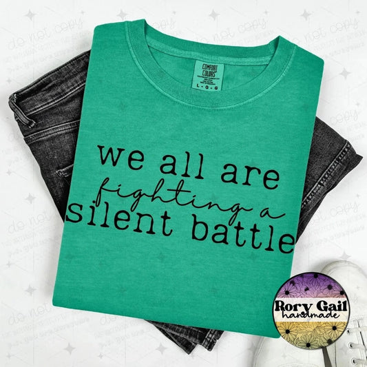 OCo T-Shirt We All Are Fighting a Silent Battle Adult Tee