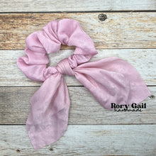 Load image into Gallery viewer, Rory Gail Handmade Satin Knotted Bow Scrunchie in the color, Pastel Pink
