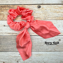 Load image into Gallery viewer, Rory Gail Handmade Satin Knotted Bow Scrunchie in the color, Coral
