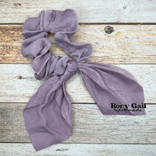 Load image into Gallery viewer, Rory Gail Handmade Satin Knotted Bow Scrunchie in the color, Lavender
