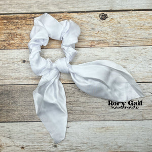 Rory Gail Handmade Satin Knotted Bow Scrunchie in the color, Bright White