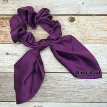 Load image into Gallery viewer, Rory Gail Handmade Satin Knotted Bow Scrunchie in the color, Grape
